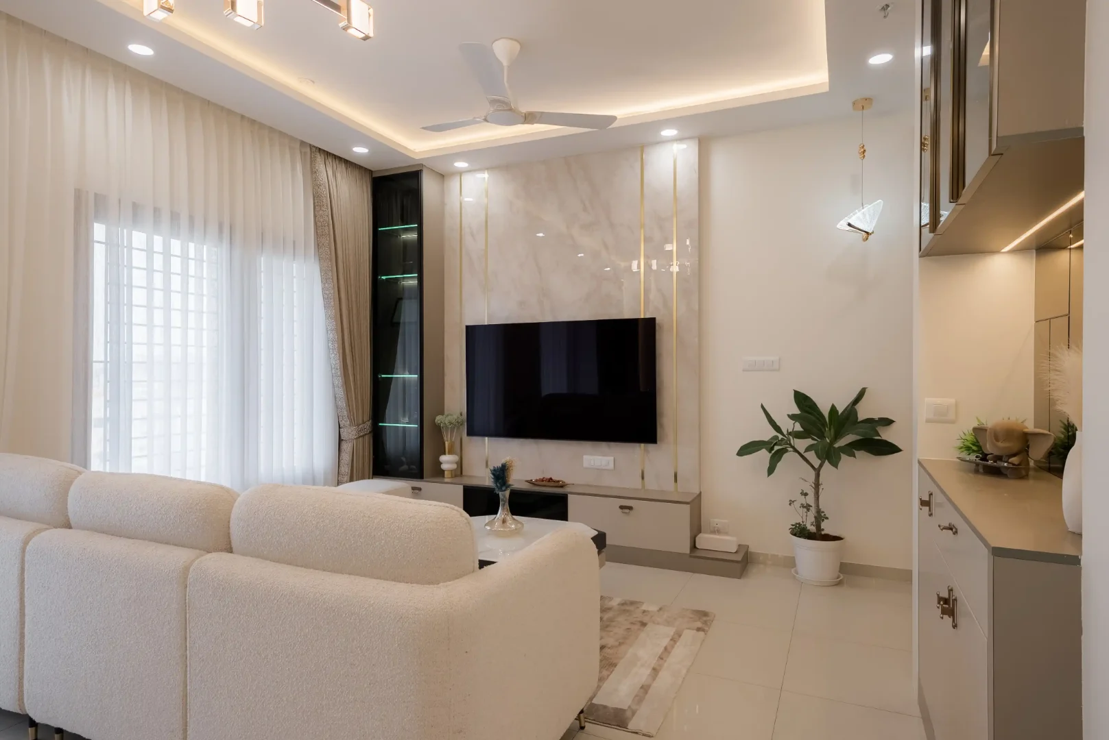 tv unit designs with white tile panel