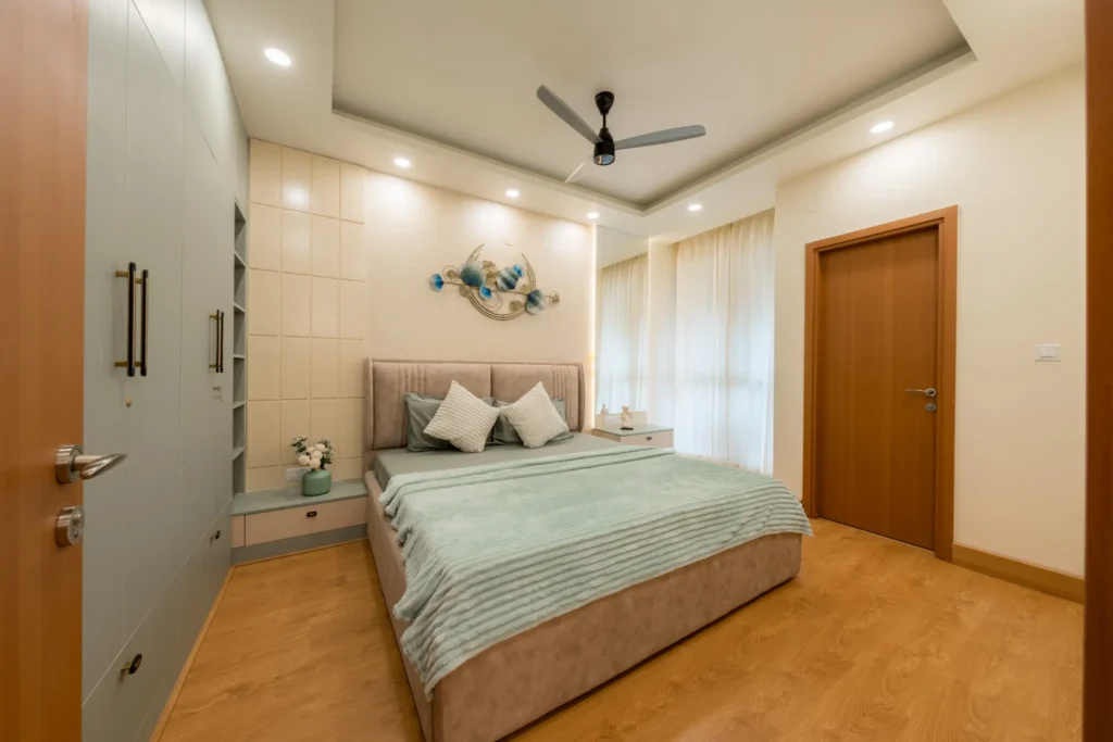 masterbedroom with wooden flooring and minimal wall design