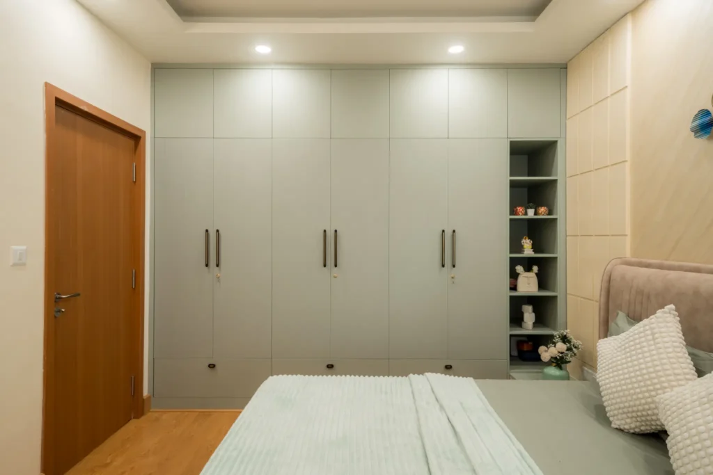 light grey wardrobe design with small open shelf for bangalore homes