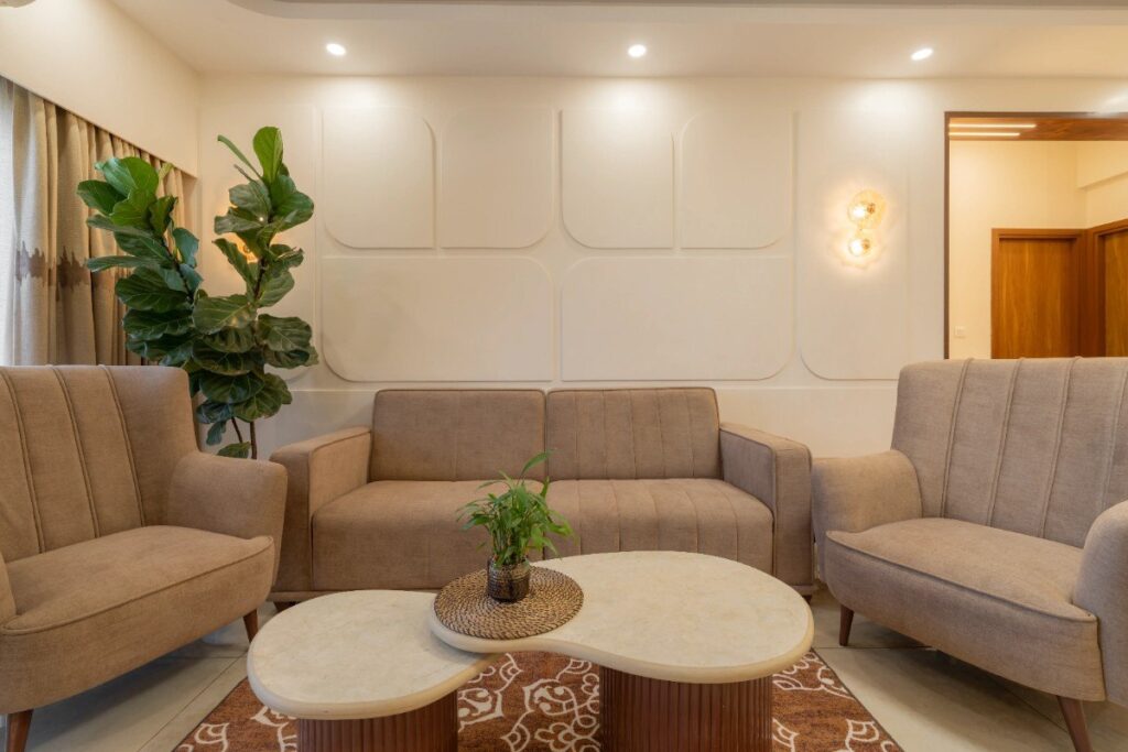 Bangalore living room interior design with sculpted white wall panels
