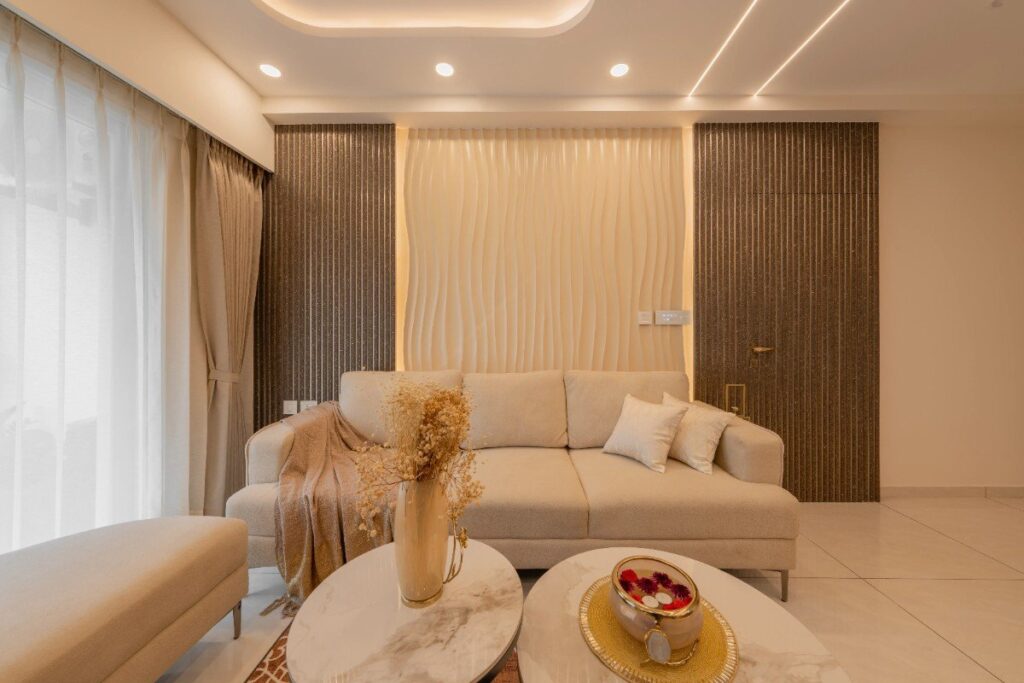 living room interior design in Bangalore with wave feature wall and cove lighting